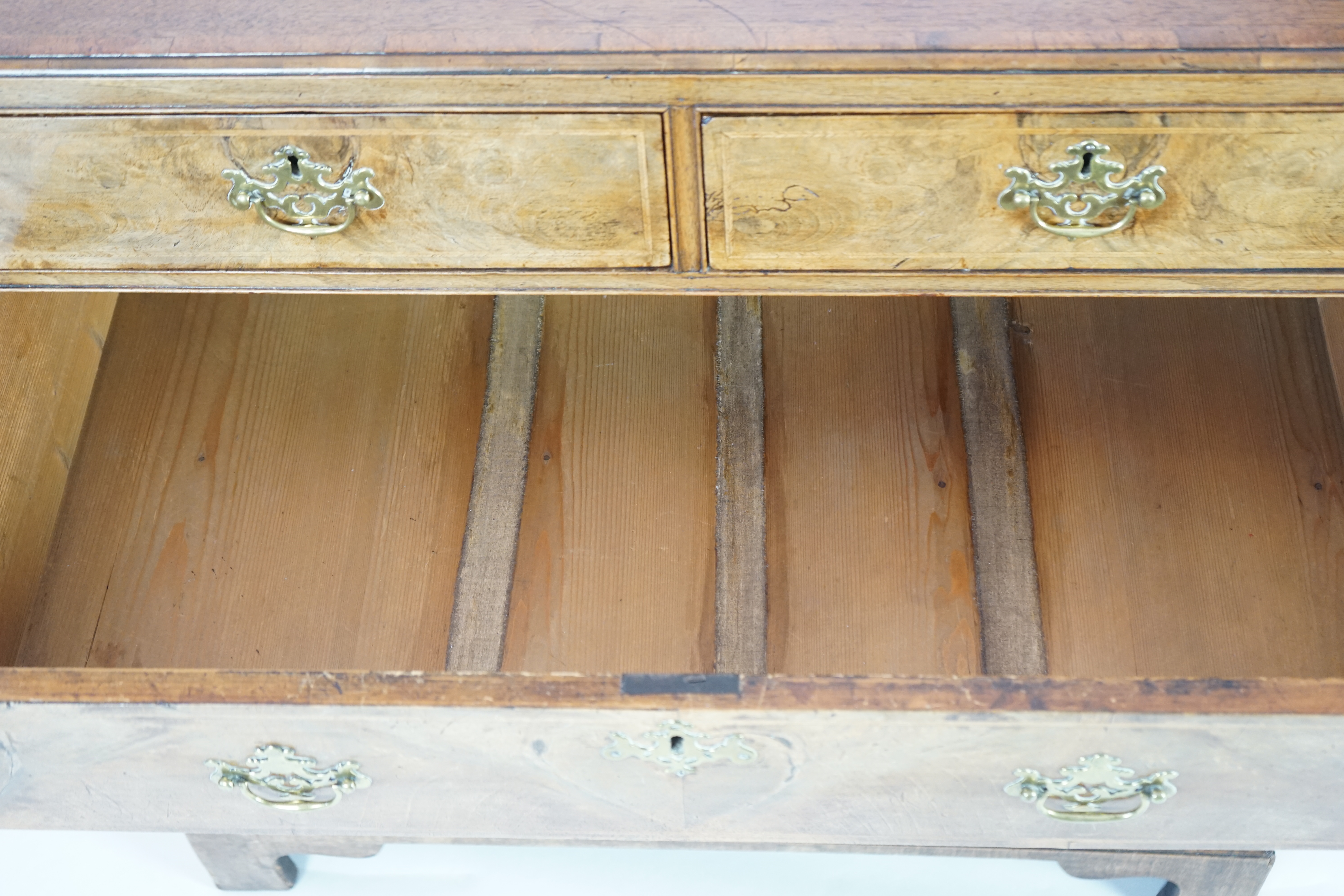 A George II walnut and feather banded caddy top chest